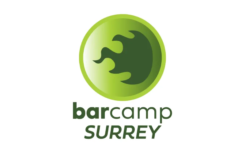 BarCamp Surrey logo, which is a green fireball heading right, inside a green circle.